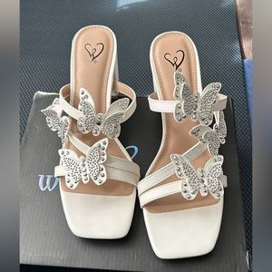 White butterfly heels